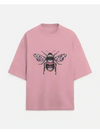 A soft pink feminine bee oversized tshirt with a detailed bee graphic featuring patterned wings and segmented body
